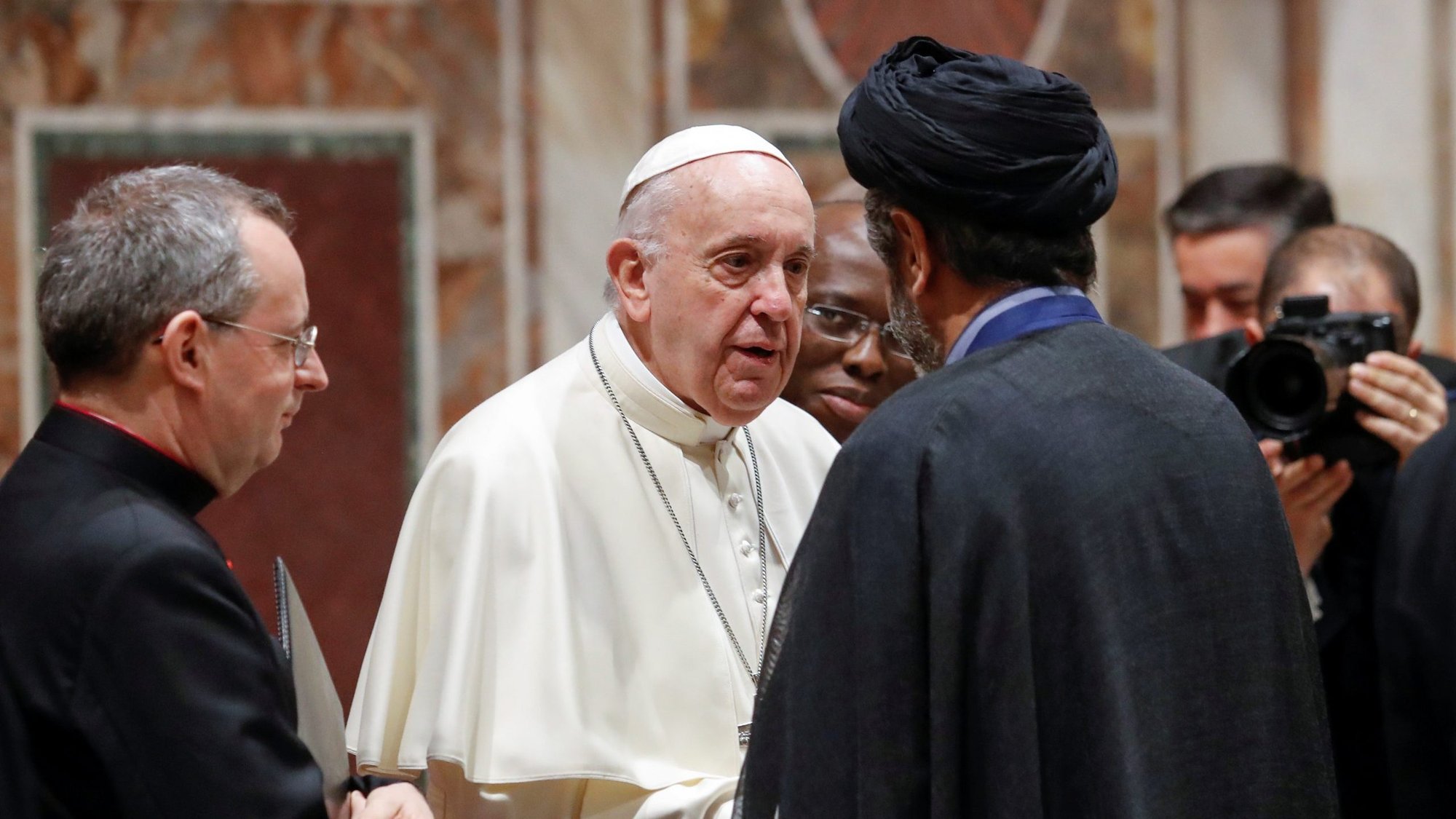 Pope Francis speaks with Iran's ambassador to the Holy See, Seyed Taha Hashemi, during an audience for the traditional exchange of new year's greetings in the Sala Regia at the Vatican Jan. 9, 2020. (CNS photo/Remo Casilli, Reuters pool)