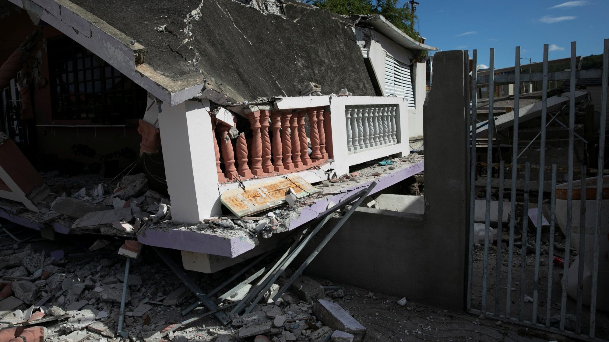 A destroyed home is seen Jan. 8, 2020, following an earthquake in Guanica, Puerto Rico. Archbishop Jose H. Gomez of Los Angeles, president of the U.S. Conference of Catholic Bishops, offered "my prayerful solidarity" to the people of Puerto Rico after a series of earthquakes killed at least one person and destroyed one Catholic church. (CNS photo/Marco Bello, Reuters)