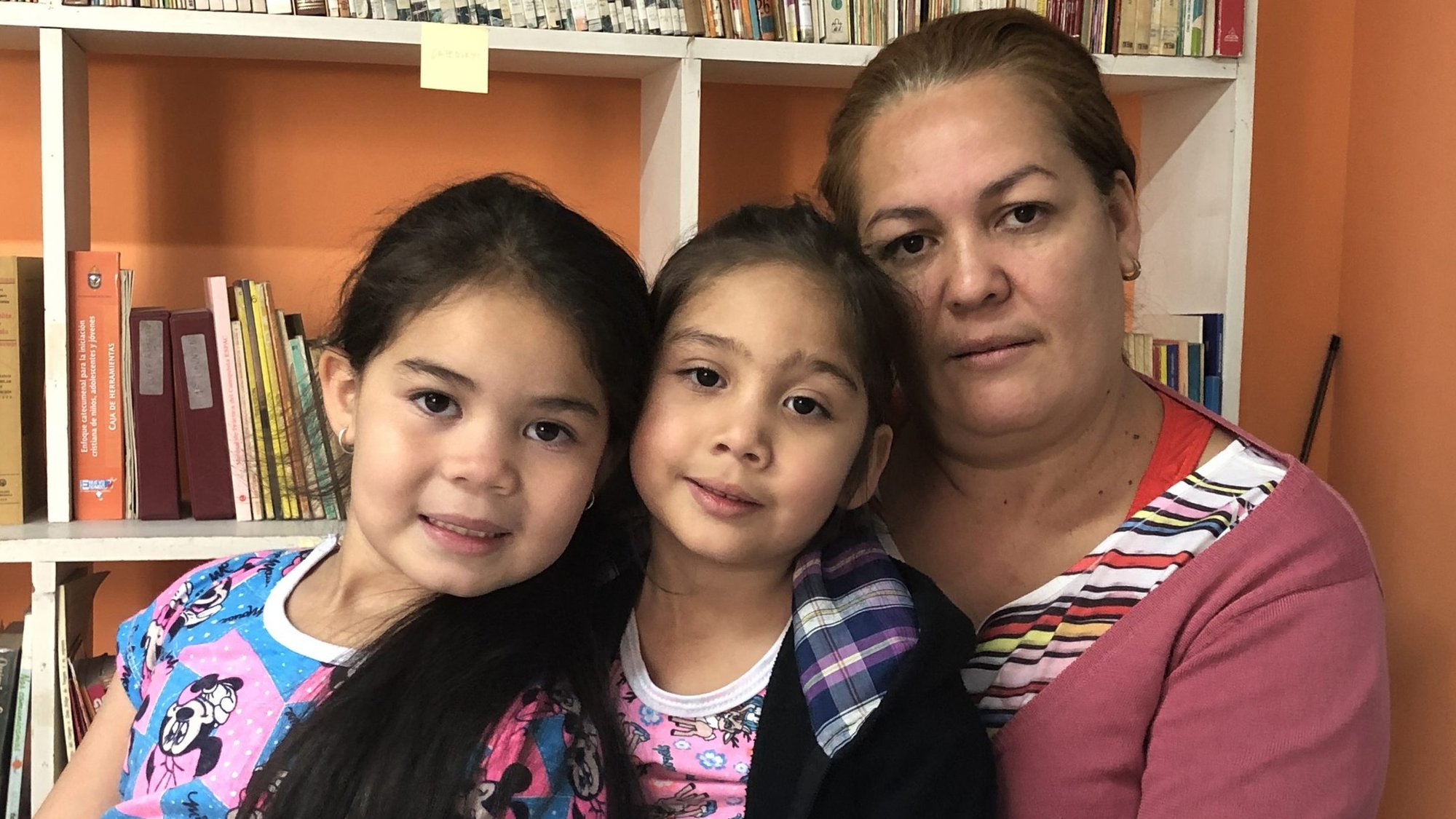 Venezuelan refugee Addy Arrieche poses with her two daughters at the Institute for the Construction of Peace Foundation (FICONPAZ) in Bogota, Colombia, Jan. 28, 2020. (CNS photo/Miguel Guilarte)