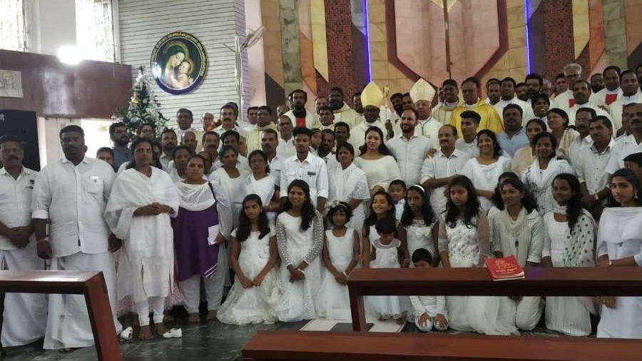 Sajith Joseph and others after being received into the Church at St. Mary's Cathedral in Punalur, Dec. 21, 2019. (Courtesy photo via CNA)