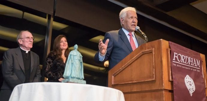 Alex Trebek accepts Fordham's Founders Award, presented by university president, Father Joseph McShane. (Photo courtesy of Fordham University via Crux)