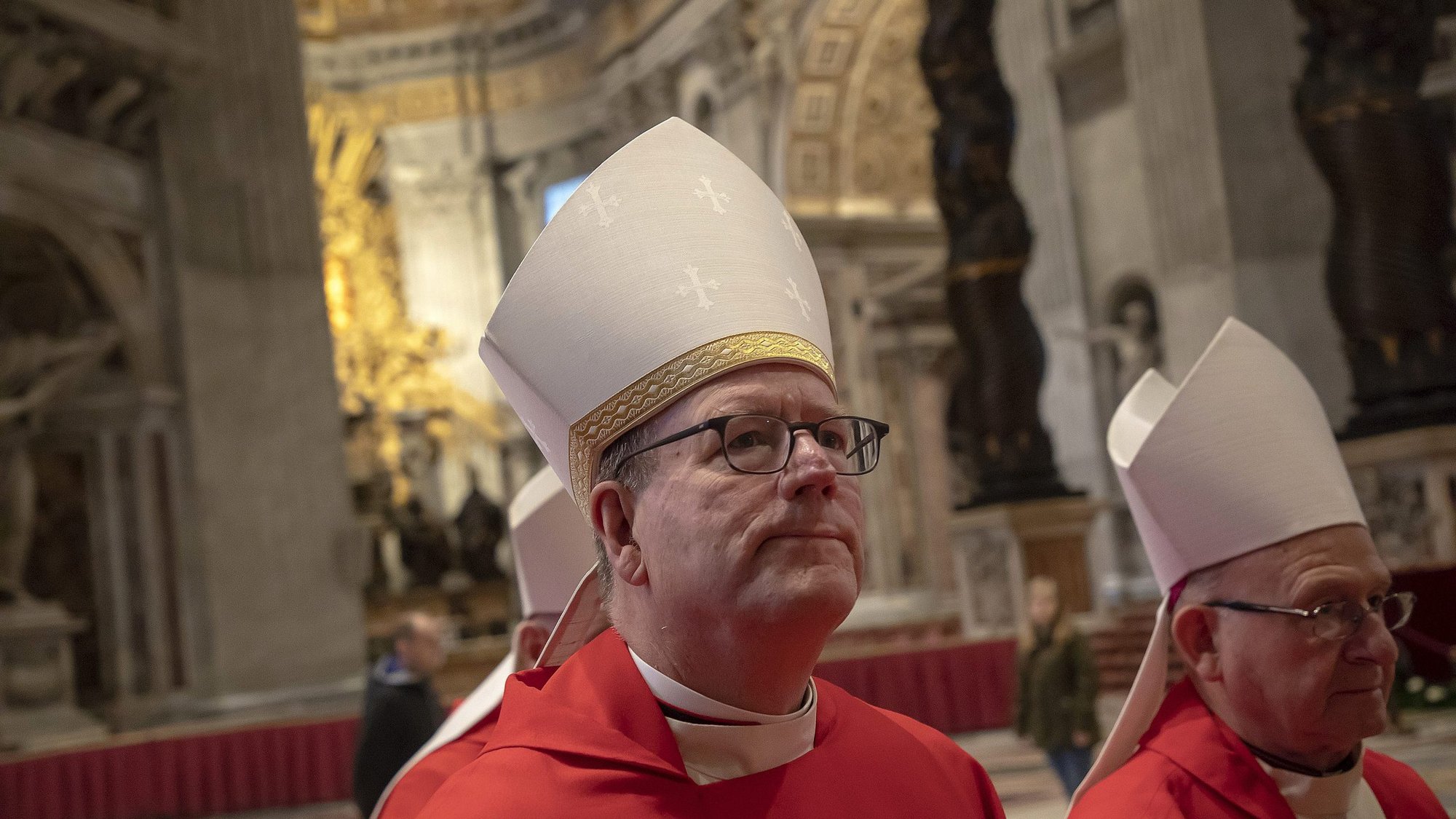 Auxiliary Bishop Robert E. Barron of Los Angeles and bishops from California, Hawaii and Nevada process to Mass in the crypt of St. Peter's Basilica during their "ad limina" visits to the Vatican Jan. 27, 2020. (CNS photo/Stefano Dal Pozzolo)