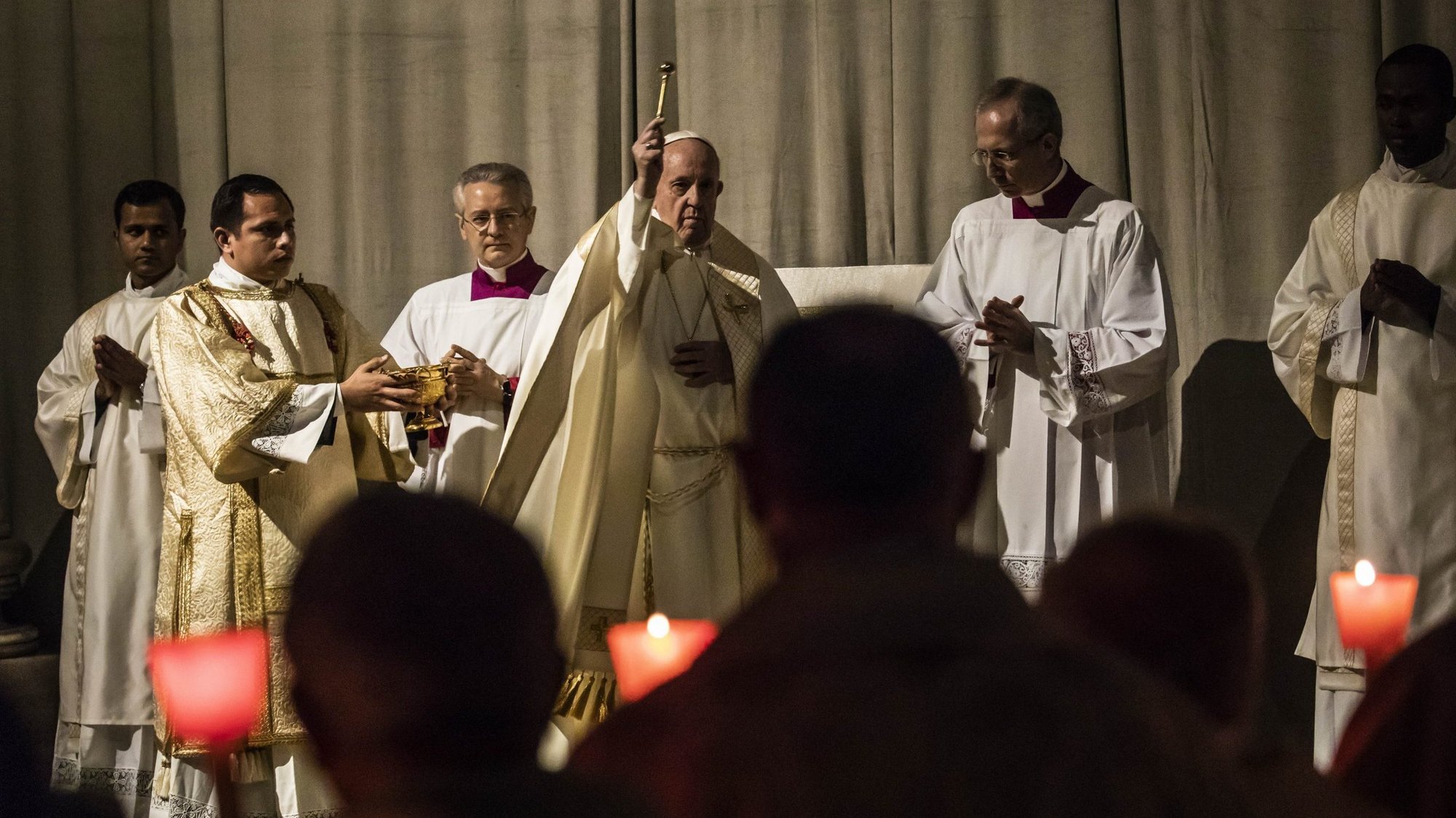 Pope Francis uses holy water as he celebrates a Mass marking the World Day for Consecrated Life in St. Peter's Basilica at the Vatican Feb. 1, 2020. The Mass was celebrated on the vigil of the feast of the Presentation of the Lord. (CNS photo/Stefano Dal Pozzolo, pool)