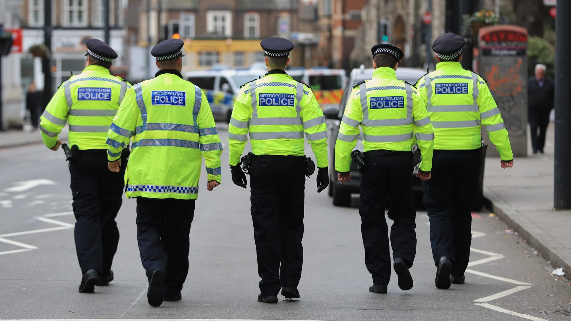 Police walk near along a London street Feb. 3, 2020, following the terror attack in the city believed to be orchestrated by Sudesh Amman, 20, who was shot dead by armed police following what police declared a terrorist-related incident. (CNS photo/Aaron Chown, Reuters)
