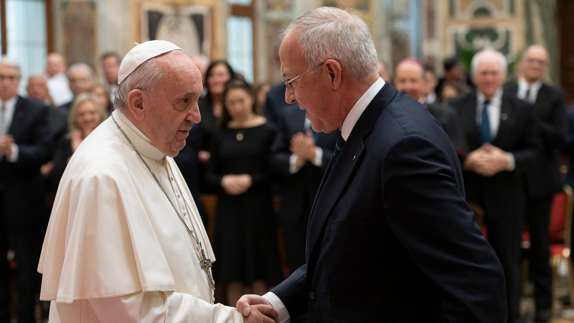 Pope Francis greets Supreme Knight Carl A. Anderson of the Knights of Columbus during an audience with a delegation from the Knights at the Vatican Feb. 10, 2020. Members of the Knight's board of directors were in Rome to celebrate the 100th anniversary of the organization's active presence in Rome. (CNS photo/Vatican Media)