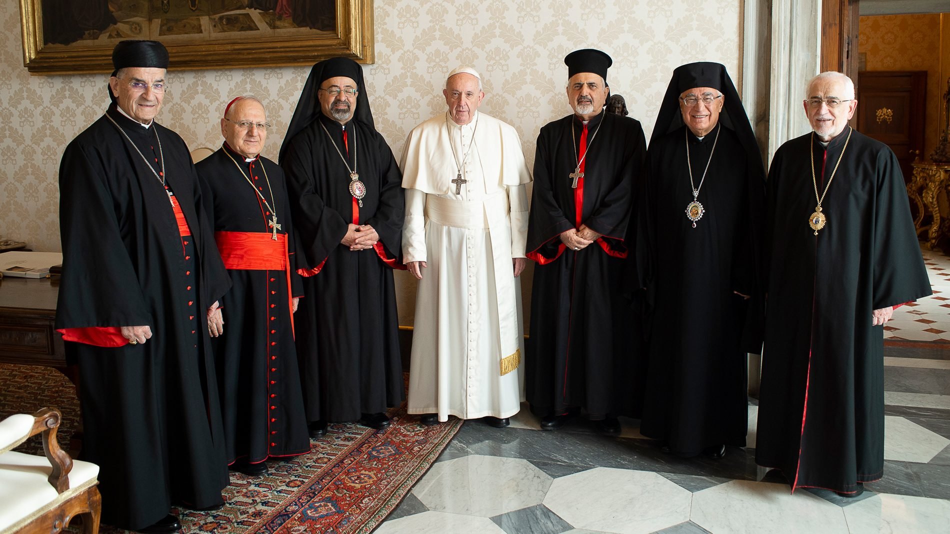 Pope Francis poses with Catholic patriarchs of the Middle East at the Vatican Feb. 7. Pictured with the pope are Lebanese Cardinal Bechara Rai, patriarch of the Maronite Catholic Church; Iraqi Cardinal Louis Sako, Chaldean Catholic patriarch; Coptic Catholic Patriarch Ibrahim Isaac Sedrak; Syriac Catholic Patriarch Ignace Joseph III Younan; Melkite Catholic Patriarch Joseph Absi; and Armenian Catholic Patriarch Gregoire Pierre XX Ghabroyan of Cilicia. (CNS photo/Vatican Media)