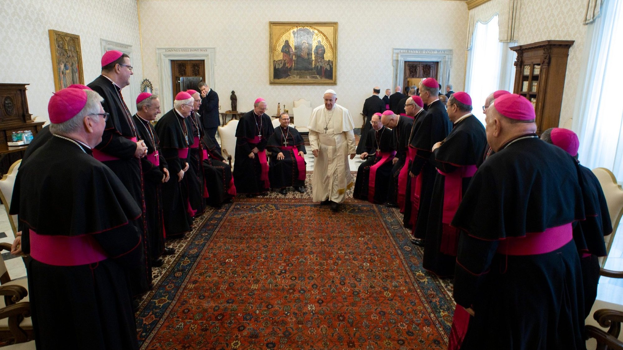 Pope Francis walks to his chair as he leads a meeting with U.S. bishops from Florida, Georgia, North Carolina and South Carolina at the Vatican Feb. 13, 2020. The bishops were making their "ad limina" visits to the Vatican to report on the status of their dioceses to the pope and Vatican officials. (CNS photo/Vatican Media)