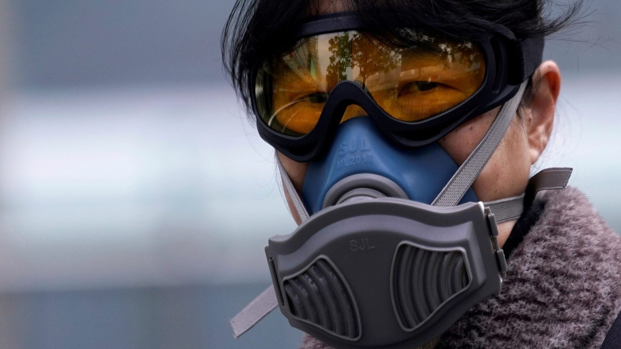 A woman wearing a mask is seen at a subway station in Shanghai Feb. 13, 2020, as the country is hit by an outbreak of the coronavirus. Around the world, people are paying close attention to the coronavirus, which has infected more than 64,000 people and killed at least 1,383 as of Feb. 14. (CNS photo/Aly Song, Reuters)