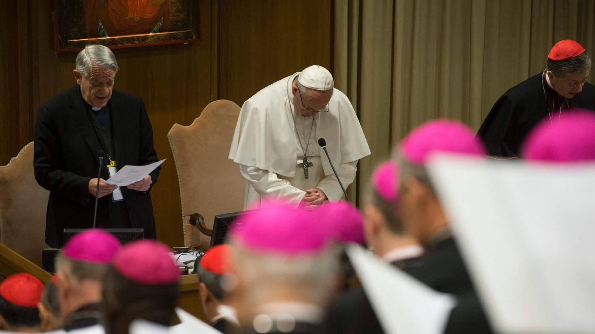 Pope Francis prays Feb. 22, 2019, the second day of the Vatican meeting on the protection of minors. After the pope convened the historic summit one year ago to address abuse and accountability, much has been done, but still more needs done. (CNS photo/Vatican Media via Reuters)