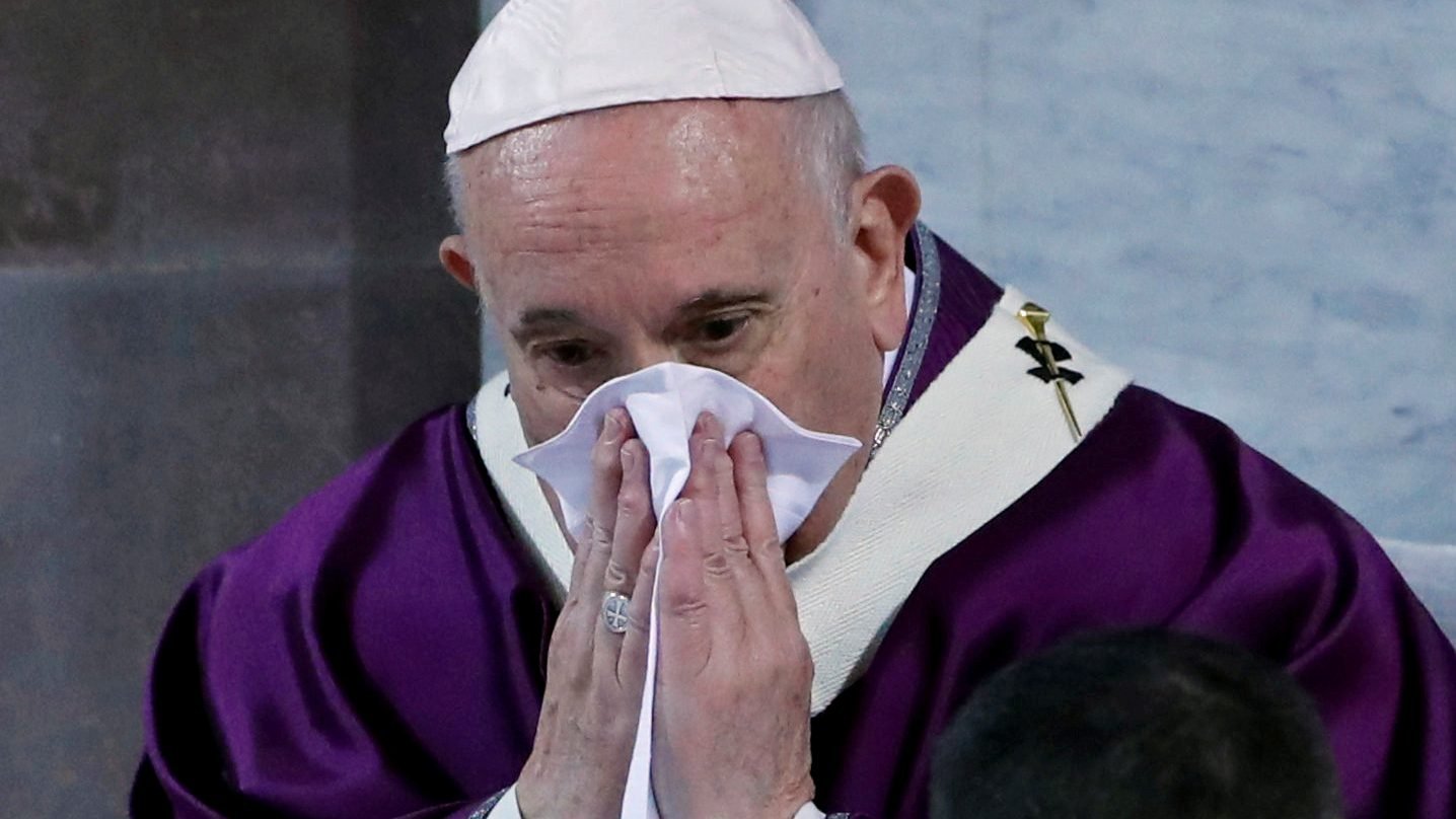 Pope Francis uses a handkerchief during Ash Wednesday Mass at the Basilica of Santa Sabina in Rome Feb. 26, 2020. (CNS photo/Remo Casilli, Reuters)