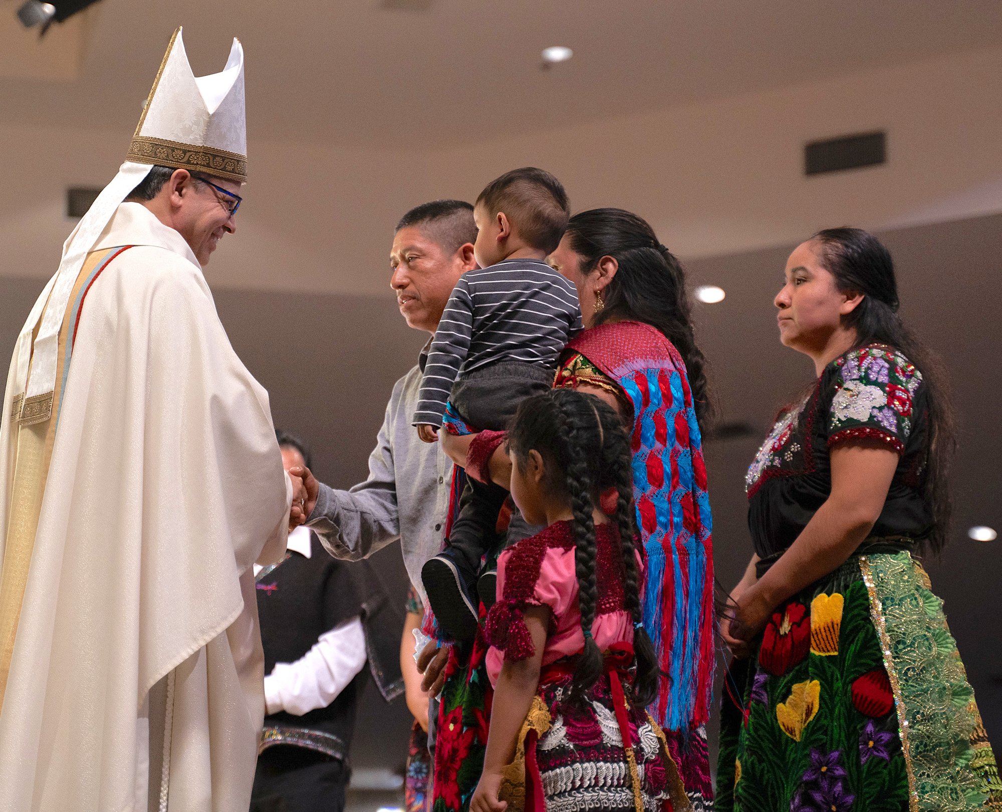 At the start of the Mass of Welcome, representatives of six different communities presented Bishop Rojas with a gift while identifying their community. (Diocese of San Bernardino)