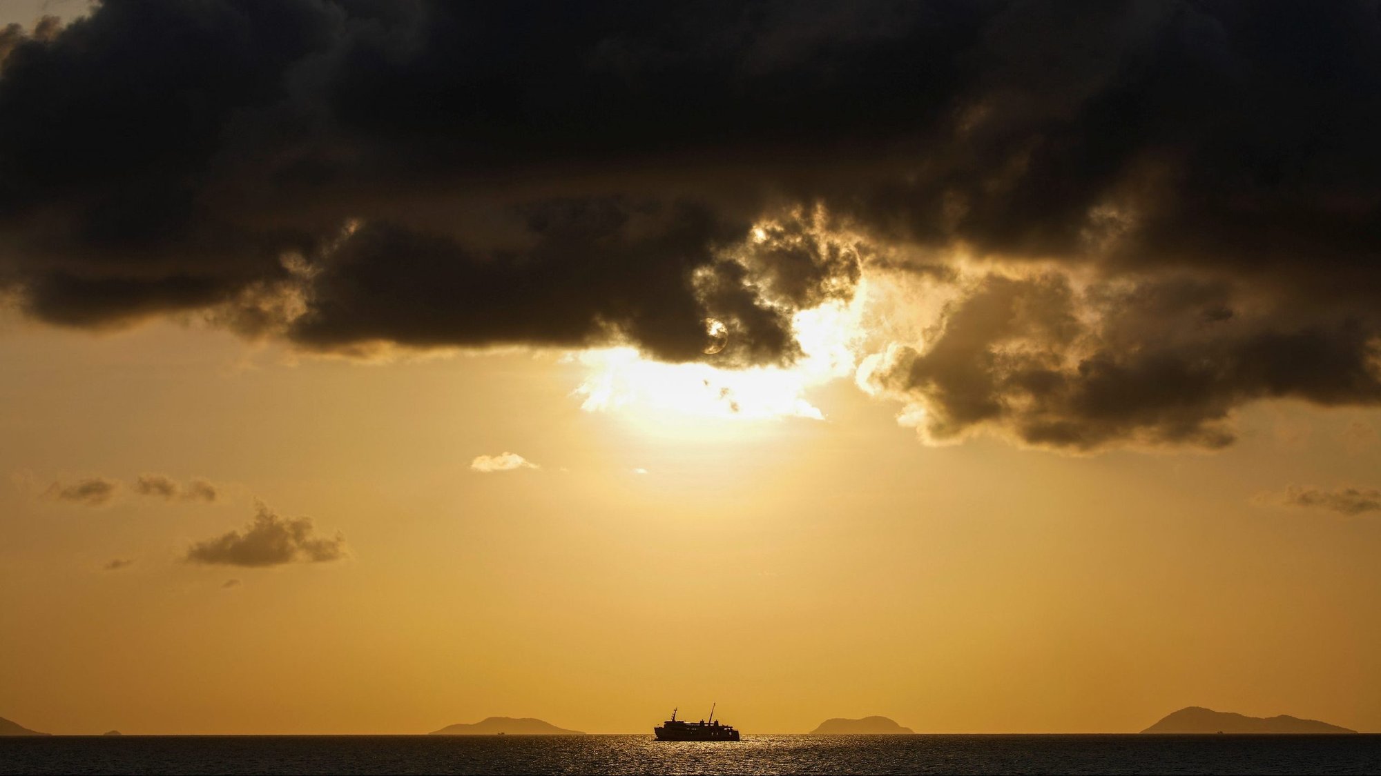 A ship sails on the Gulf of Thailand during sunset at Ko Samui March 3, 2020. Saying he wanted to renew his "urgent call to respond to the ecological crisis," Pope Francis asked Catholics around the globe to participate in the international observance of "Laudato Si' Week" May 16-24. (CNS photo/Navesh Chitrakar, Reuters)