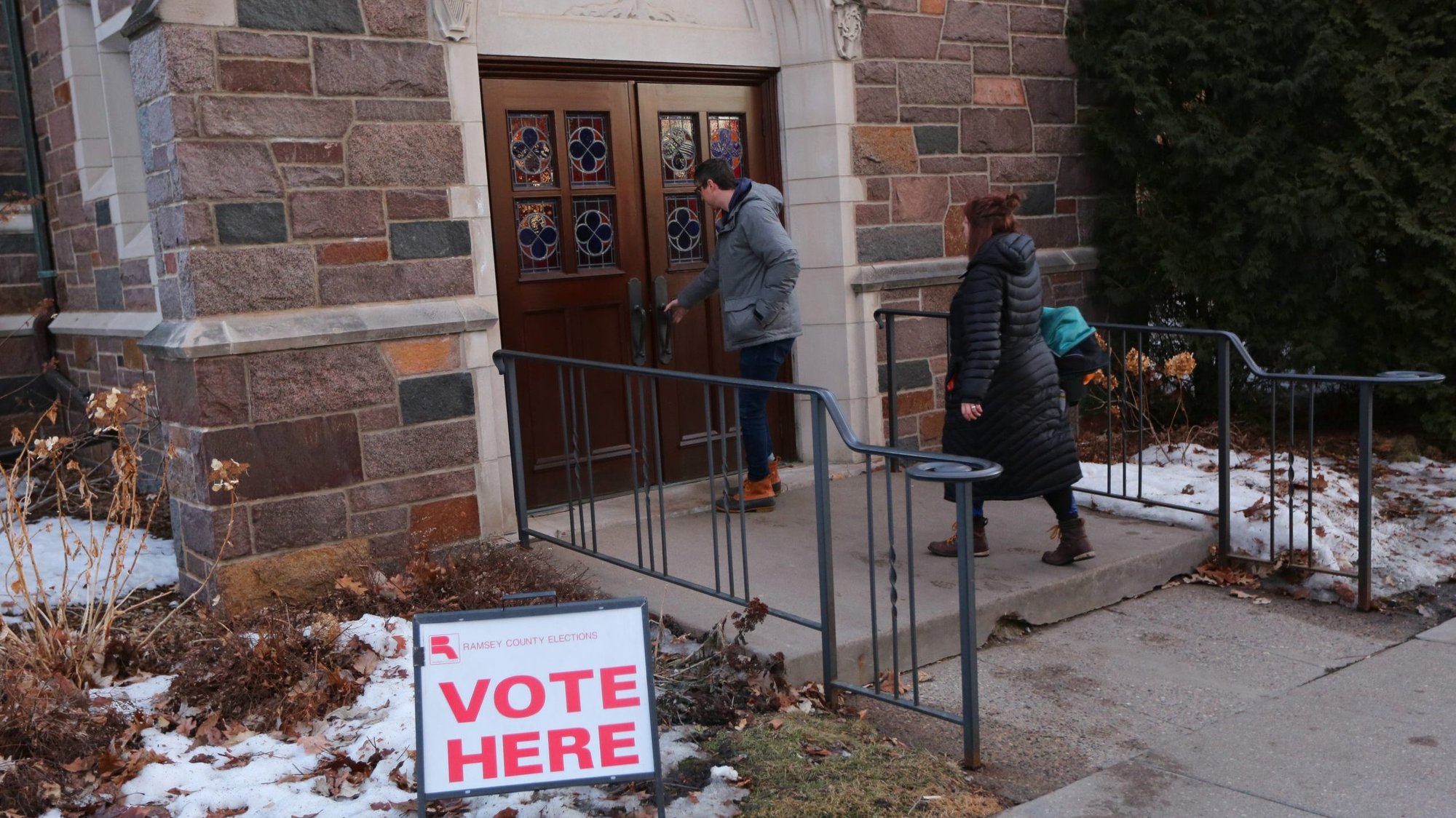 People enter Nativity of Our Lord Church in St. Paul, Minn., March 3, 2020. The church served as a polling place for the Super Tuesday presidential primary. (CNS photo/Dave Hrbacek, Catholic Spirit)