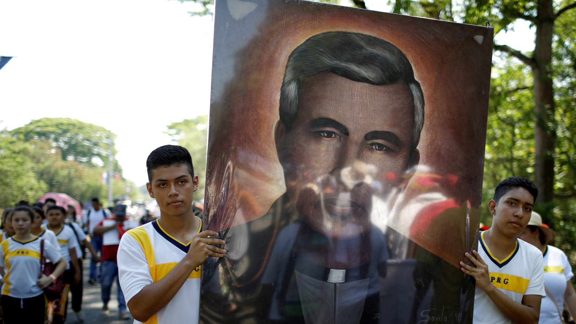 Catholic school students participate in the commemoration of the 1977 murder of Jesuit Father Rutilio Grande in El Paisnal, El Salvador, March 12, 2019. March 12 marks the 43rd anniversary of when Father Grande was killed while on his way to a novena. (CNS photo/Jose Cabezas, Reuters)