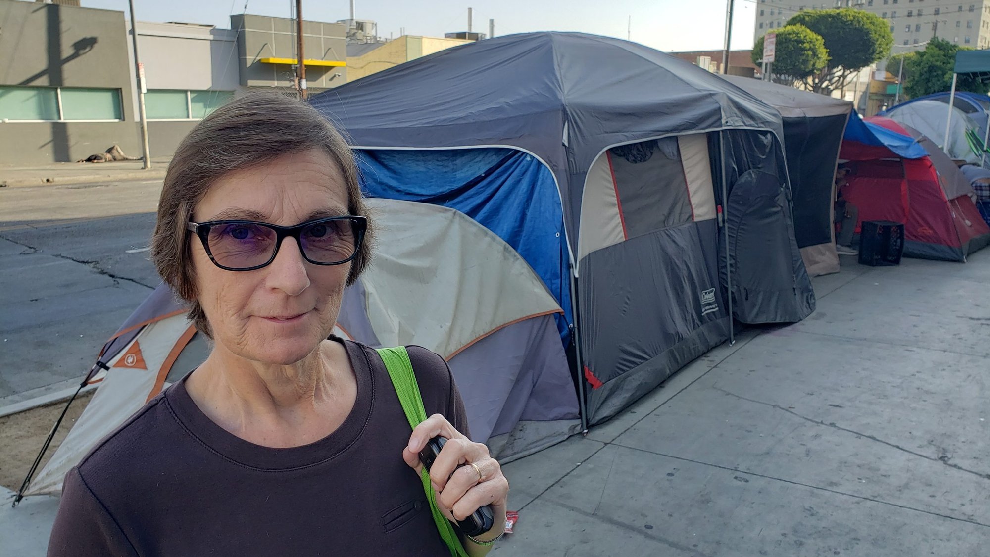 Sister Margaret Farrell, a member of the Religious Sisters of Charity, is spiritual ministry coordinator at Covenant House California in Los Angeles and a frequent visitor to the streets of Skid Row in the city's downtown area, as shown in this Oct. 17, 2019, photo. Catholic Charities staff are warning that the coronavirus pandemic presents a stark threat to the U.S. homeless population. (CNS photo/Chris Herlinger, courtesy Global Sister Report)
