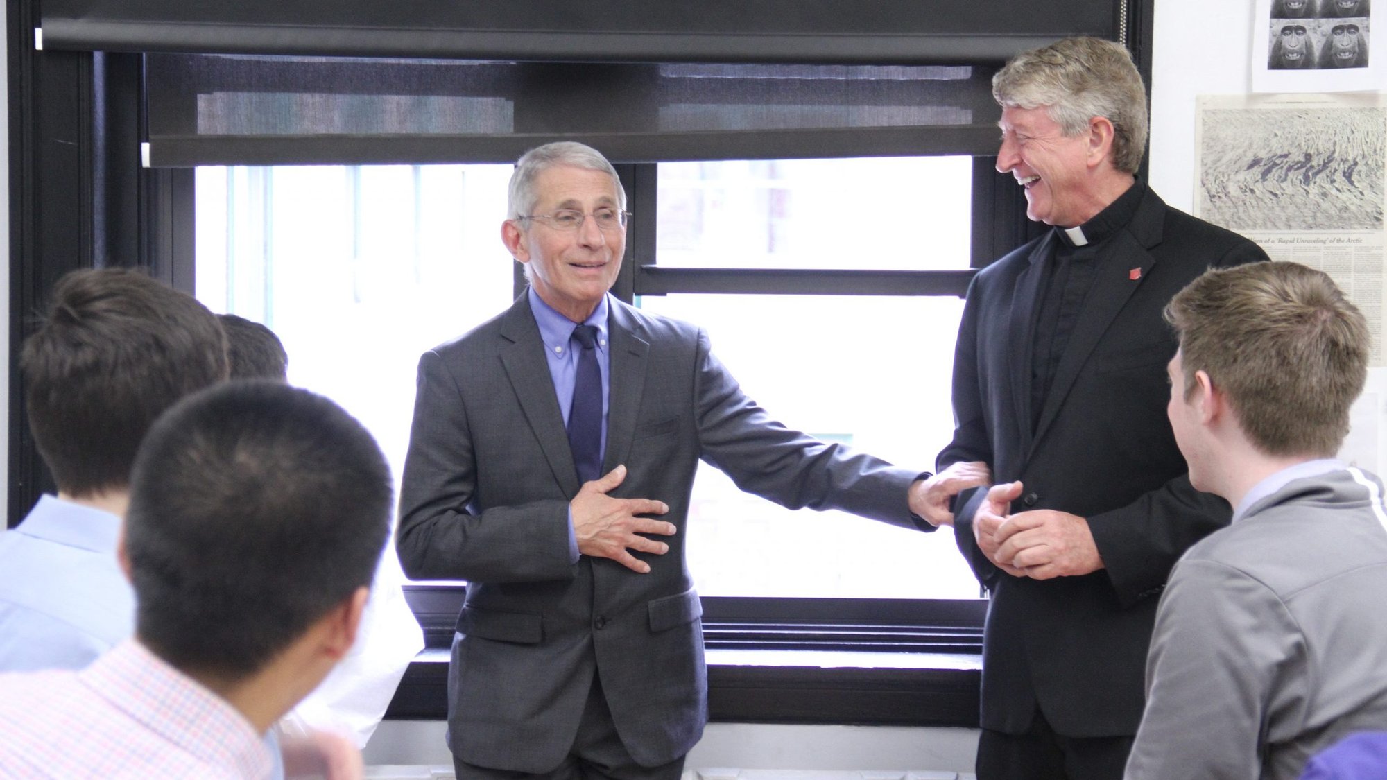 Dr. Anthony Fauci meets with New York City's Regis High School students and the school's president, Jesuit Father Daniel Lahart, in 2019. Fauci, who is the director of the National Institute of Allergy and Infectious Diseases, is a 1958 graduate of Regis. (CNS photo/courtesy Regis High School)