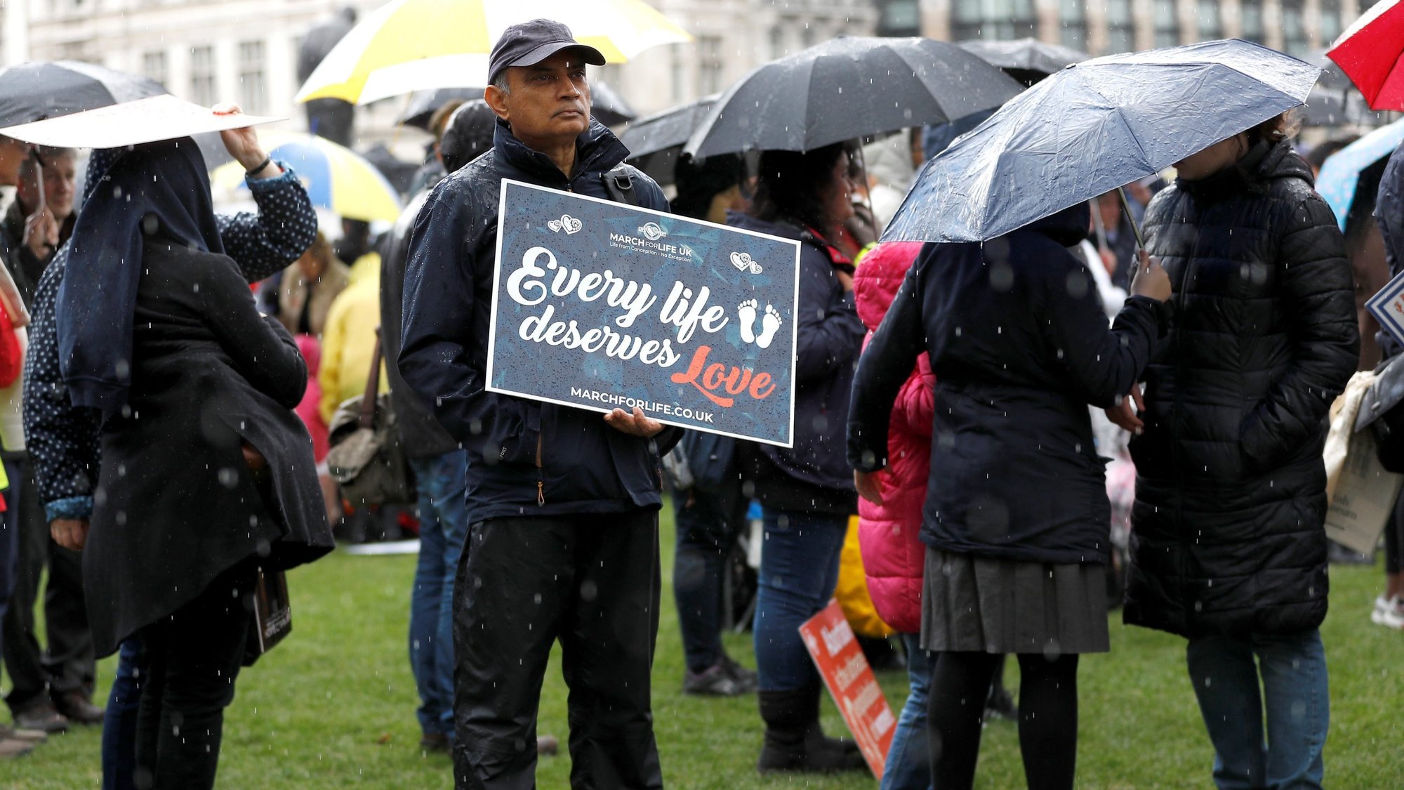 A pro-life demonstrator holds a placard during the March For Life rally in London May 11, 2019. The English bishops have express their shock at an emergency policy to allow "do-it-yourself abortions" during the 2020 coronavirus pandemic. (CNS photo/Peter Nicholls, Reuters)