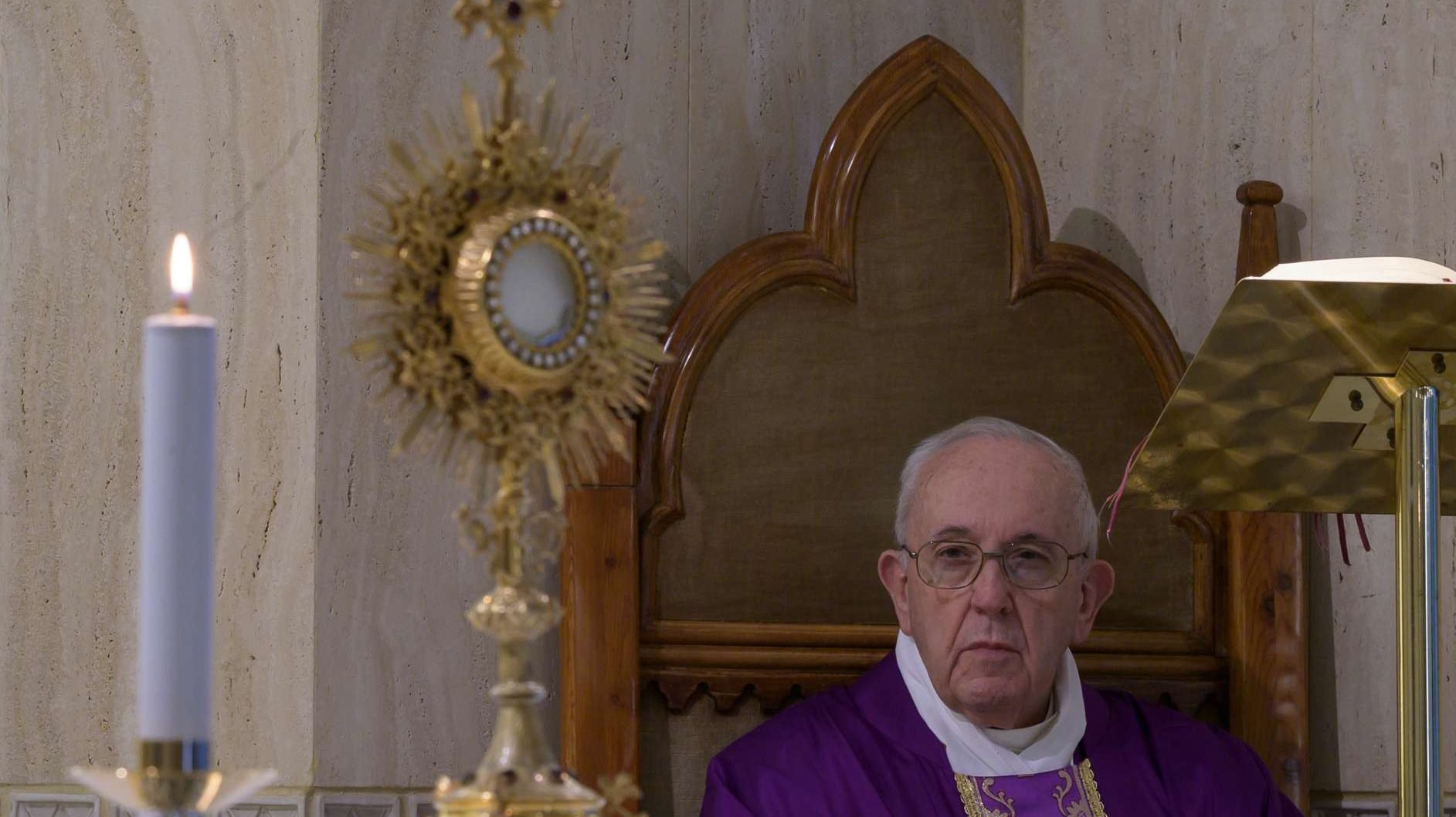 Pope Francis prays following Mass in Casa Santa Marta on March 23, 2020. (Vatican Media via CNA)