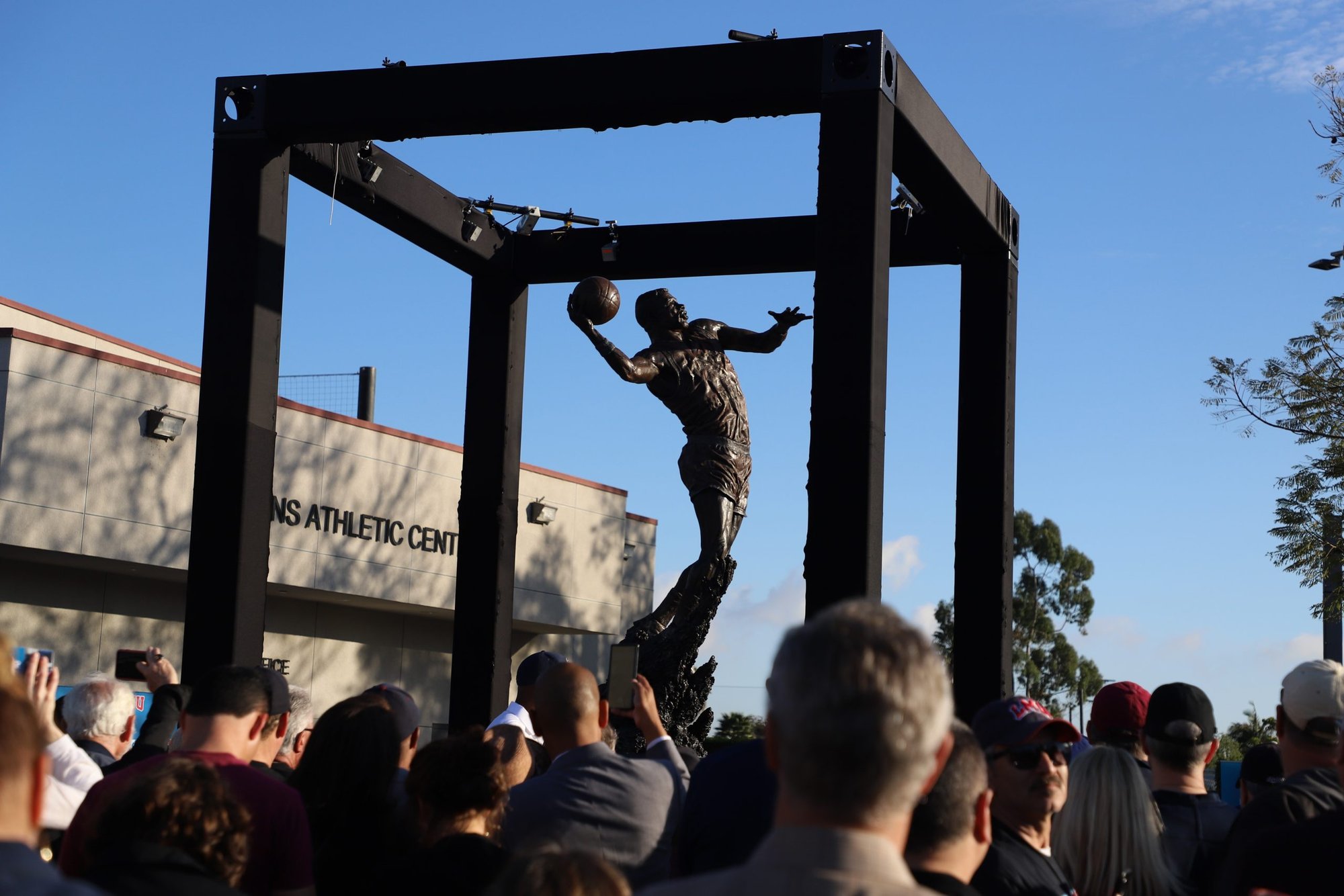 A statue of basketball legend Hank Gathers, located just outside of Loyola Marymount’s Gersten Pavilion, was unveiled Feb. 29. (Courtesy Loyola Marymount University)