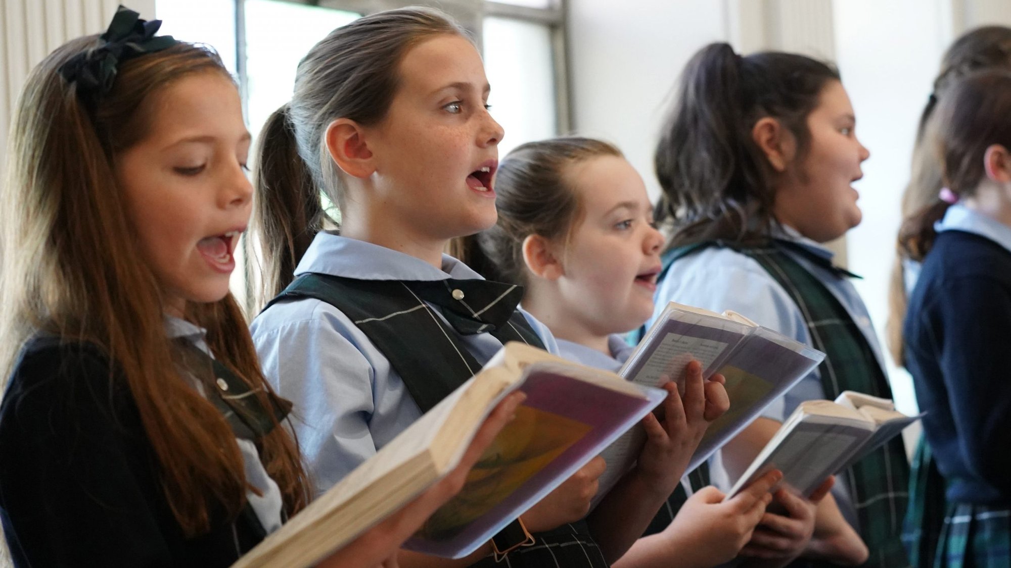 Students from St. Martin of Tours School in Amityville, N.Y., sing with the children's choir during a Mass marking the opening of "Celebrate Catholic Schools Week" at St. Martin of Tours Church Jan. 26, 2020. (CNS photo/Gregory A. Shemitz)