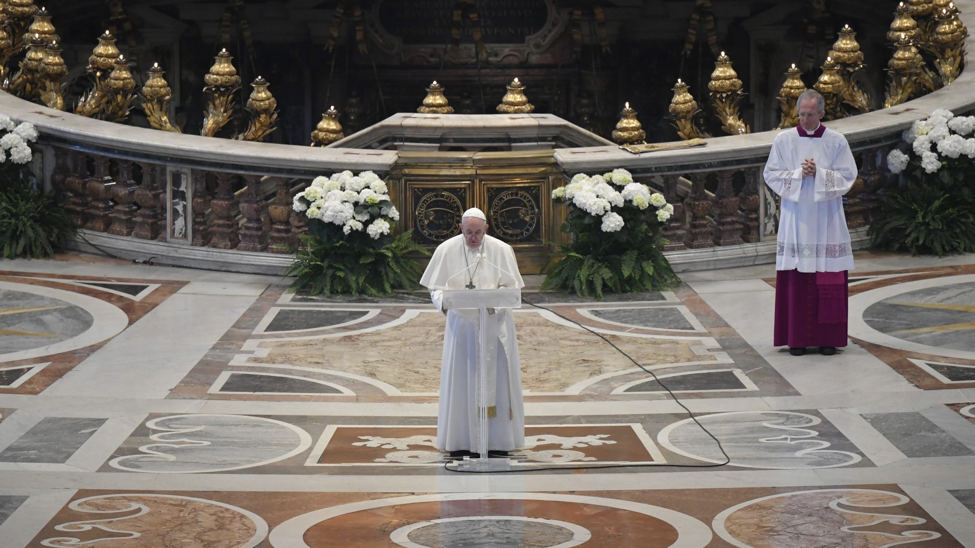 Pope Francis delivers his Easter message "urbi et orbi" (to the city and the world) after celebrating Easter Mass in St. Peter's Basilica at the Vatican April 12, 2020. The Mass was celebrated without the presence of the public due to the coronavirus pandemic. (CNS photo/Vatican Media)
