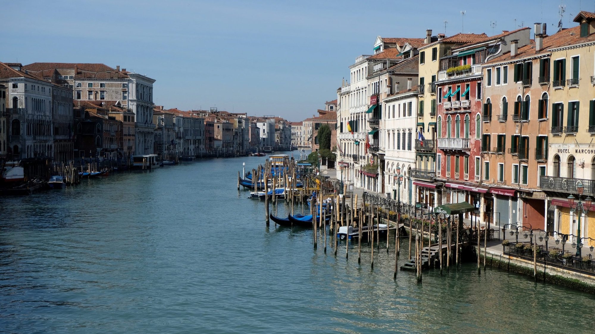 Clear water is seen in the Grand Canal in Venice, Italy, in mid-April because of fewer tourists, motorboats and pollution during the COVID-19 pandemic. Earth Day, the annual United Nations event, is celebrated every April 22 as a way to call attention to protecting the earth's natural resources. (CNS photo/Manuel Silvestri, Reuters)