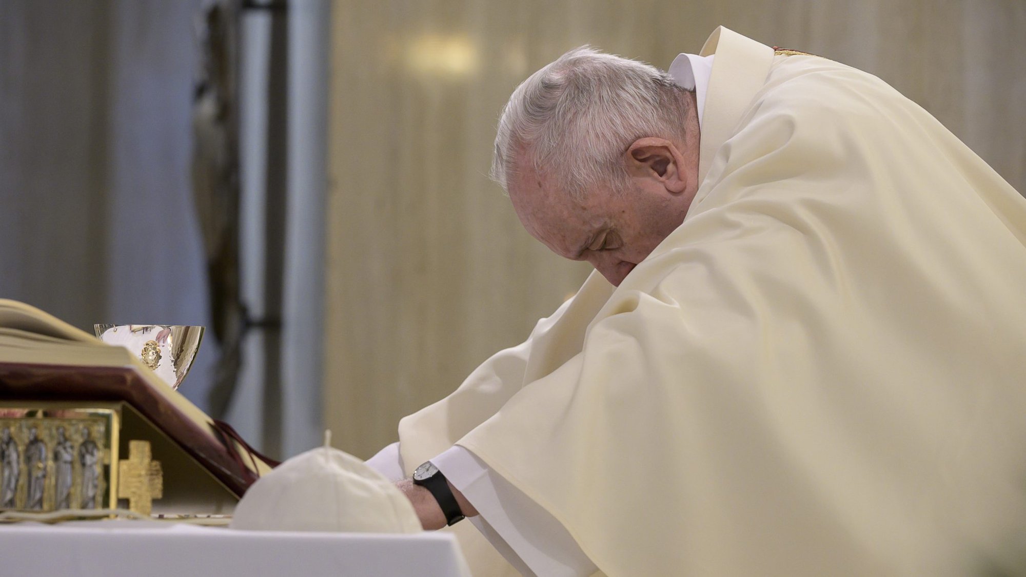 Pope Francis celebrates Mass April 30, 2020, in the chapel of his Vatican residence, the Domus Sanctae Marthae. At the start of the Mass, the pope prayed for the unknown victims who died from the coronavirus and were buried in common graves. (CNS photo/Vatican Media)