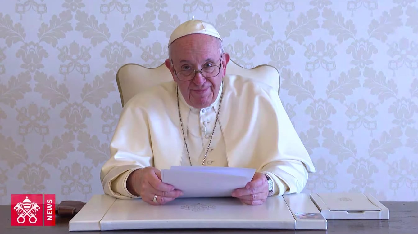 Pope Francis speaks from the Vatican in this image taken from a video message to young people of the Archdiocese of Krakow, Poland, commemorating the 100th anniversary of St. John Paul's birth. (CNS photo/Holy See Press Office)