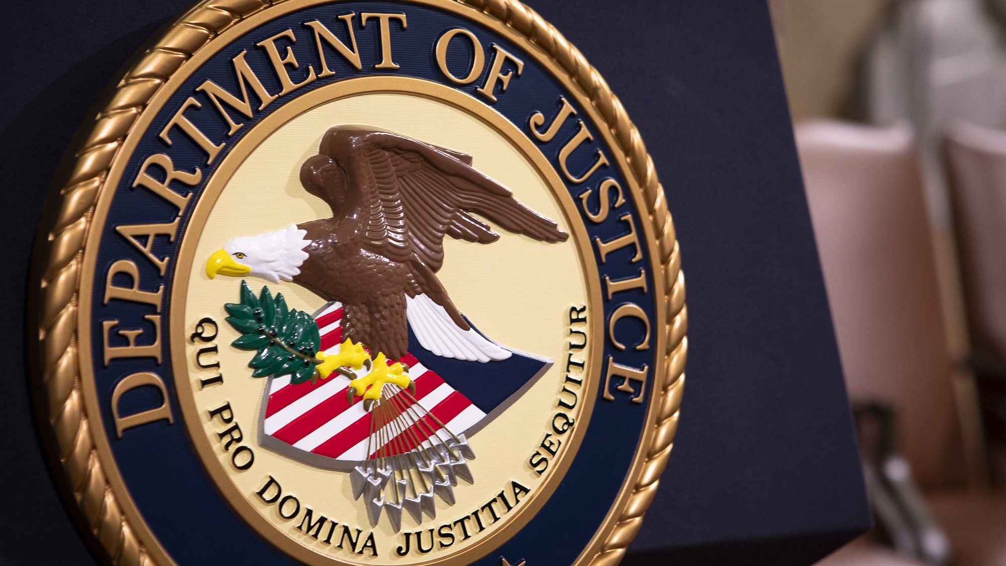 The Department of Justice seal is seen in the Great Hall at the Main Justice Building in Washington in this 2018 file photo. A debate continues on whether government-imposed restrictions on in-person religious services during pandemic violates religious liberties. (CNS photo/Tyler Orsburn)