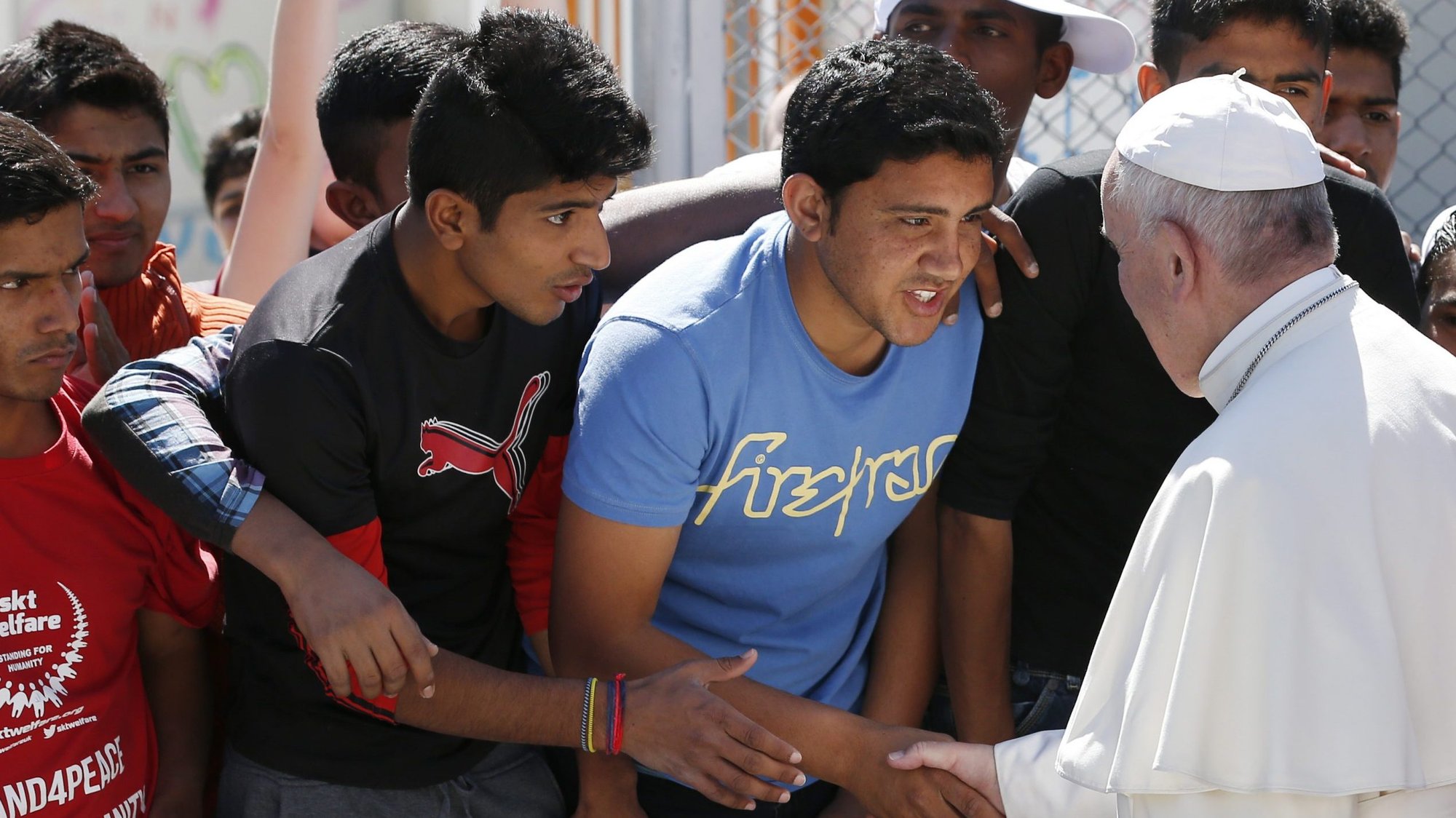 Pope Francis meets refugees at the Moria refugee camp on the island of Lesbos, Greece, in this 2016 file photo. In a May 23, 2020, letter the pope expressed his gratitude to a Jesuit-run refugee center in Rome for its continued care for migrants and refugees fleeing war, persecution and hunger. (CNS photo/Paul Haring)