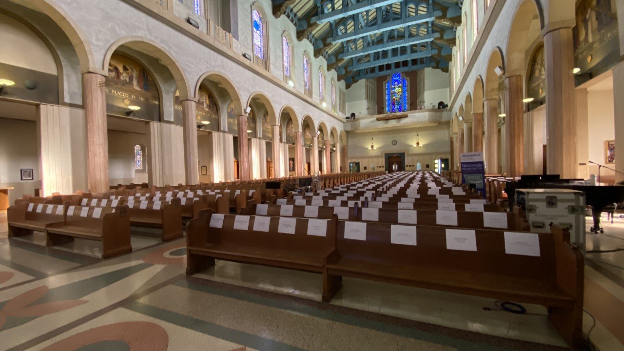 The names of first responders and essential workers are displayed on empty pews at Blessed Sacrament Church May 17. (Courtesy Blessed Sacrament Church)