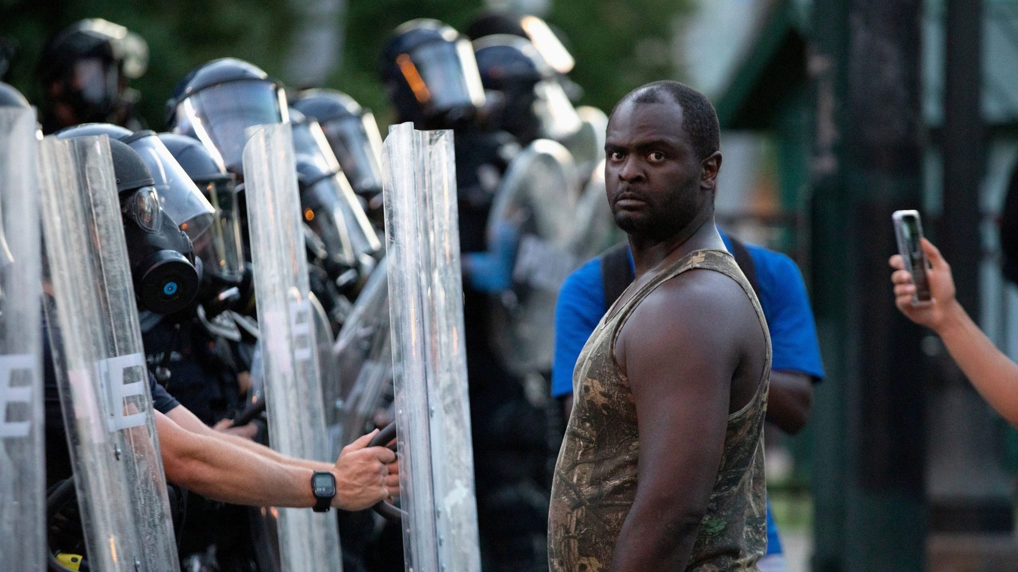 A police protester in Atlanta demonstrates May 31, 2020. Demonstrations continue after a white police officer in Minneapolis was caught on a bystander's video May 25 pressing his knee into the neck of George Floyd, an African American, who later died at a hospital. (CNS photo/Dustin Chambers, Reuters)