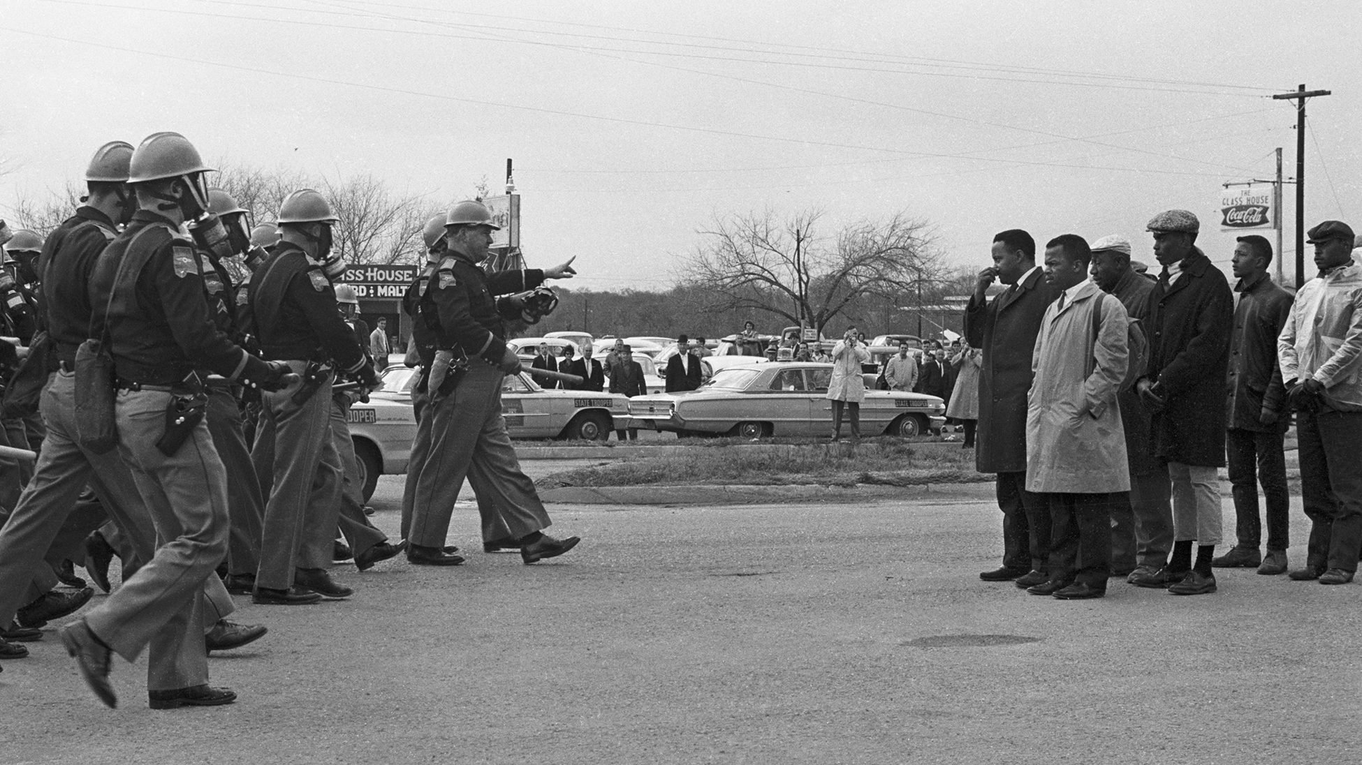 Protestors and police officers face off in Selma, Ala., March 7, 1965, in what's come to be know by civil rights activists as Bloody Sunday. The iconic photo is part of a documentary "John Lewis: Good Trouble" about the longtime racial equality activist and member of Congress. (CNS photo/courtesy Magnolia Pictures)