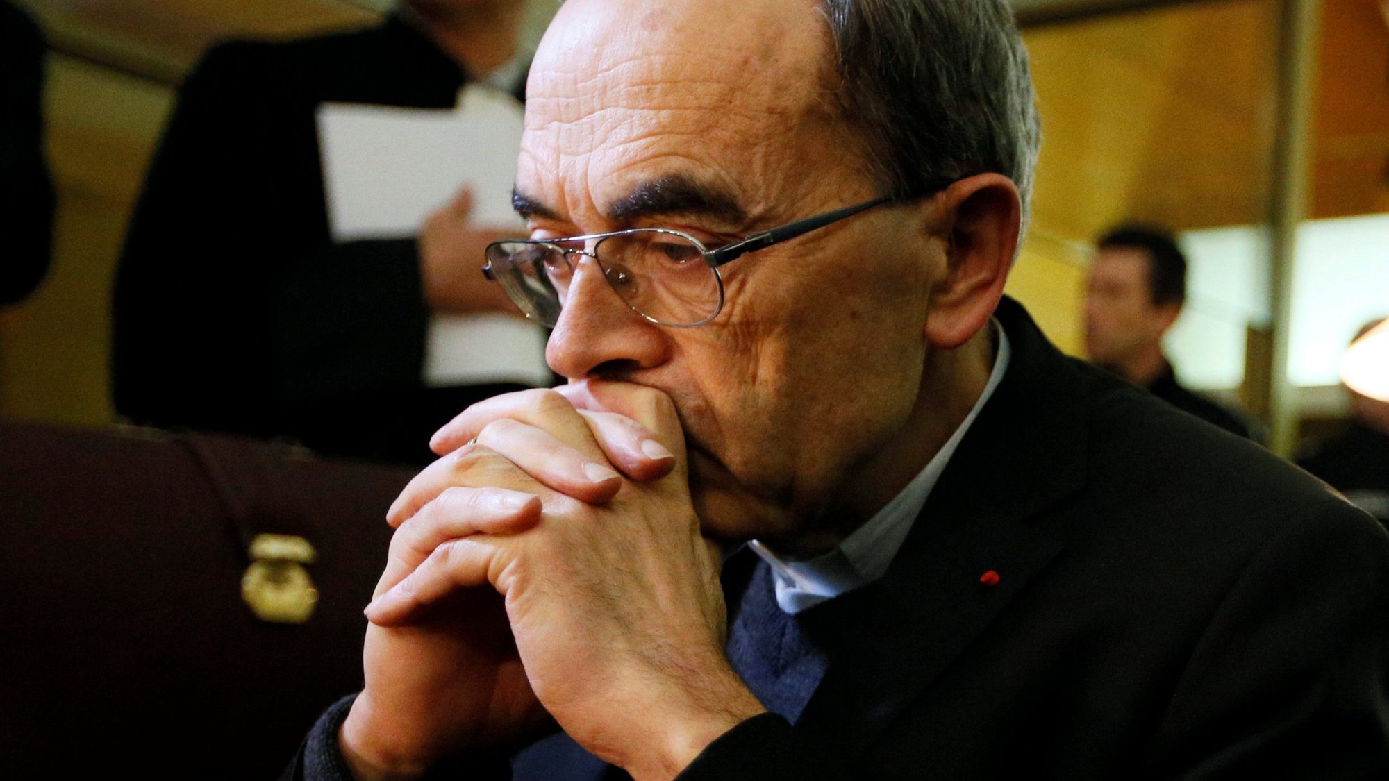 French Cardinal Philippe Barbarin of Lyon pauses at the courthouse in Lyon Jan. 7, 2019. Pope Francis accepted the resignation of Cardinal Barbarin March 6, 2020, less than six weeks after a French appeals court overturned his conviction for failing to report clerical sexual abuse. (CNS photo/Emmanuel Foudrot, Reuters)