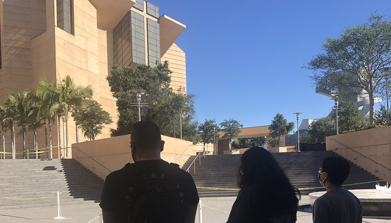 People stand outside the Cathedral of Our Lady of the Angels as bells tolled for 8 minutes and 46 seconds, the amount of time that George Floyd was held down, as a symbol of solidarity in honor of his life as he is laid to rest. (Courtesy Carolina Guevara)