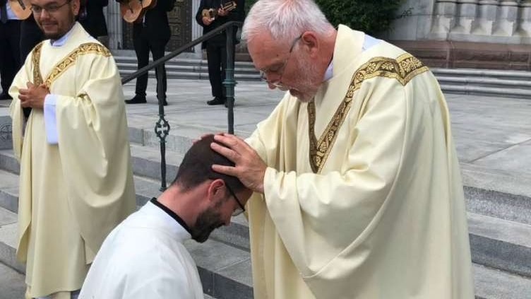 Father Edmond Ilg gives his first blessing to his son, Fr. Philip Ilg, outside Cathedral Basilica of the Sacred Heart in Newark, NJ. (Image courtesy of the Ilg family via CNA)