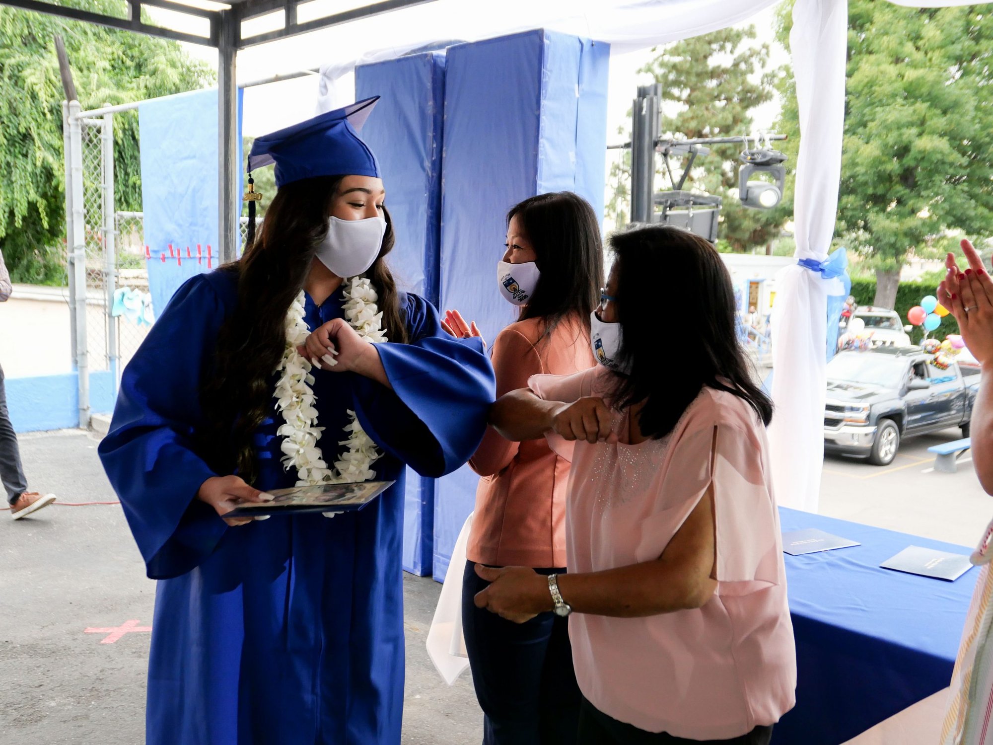 A student receives her diploma during Our Lady of Talpa School's 2020 graduation ceremony on June 5. (JohnMichael Filippone)