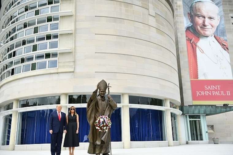 US President Donald Trump and First Lady Melania Trump visit the Saint John Paul II National Shrine, to lay a ceremonial wreath on June 2, 2020. (Brendan Smialowski / AFP via Getty)
