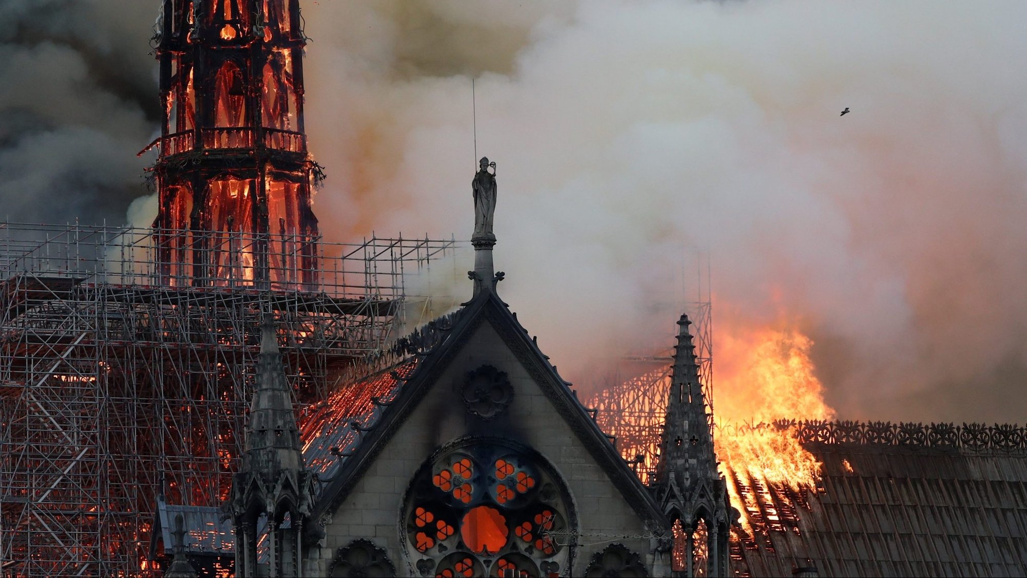 Flames and smoke billow from the Notre Dame Cathedral after a fire broke out in Paris April 15, 2019. A new study has found that the amount of lead that settled to the ground and likely seeped into houses downwind of the fire was far greater than officials indicated at the time. (CNS photo/Benoit Tessier, Reuters)