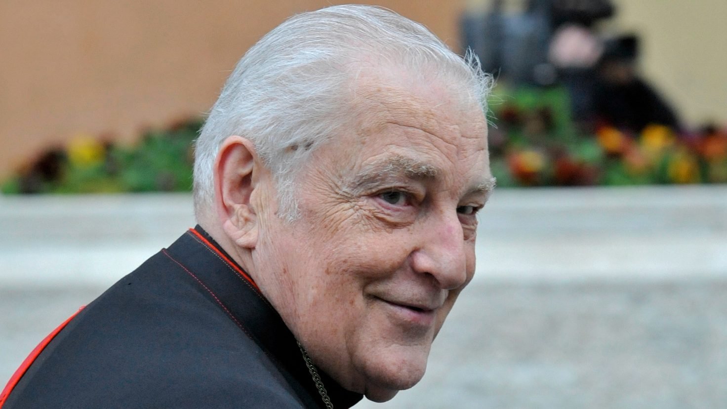 Polish Cardinal Zenon Grocholewski, retired prefect of the Congregation for Catholic Education, smiles as he arrives for a general congregation meeting in the synod hall at the Vatican in this 2013 photo. Cardinal Grocholewski died July 17, 2020, at the age of 80. (CNS photo/Chris Warde-Jones)