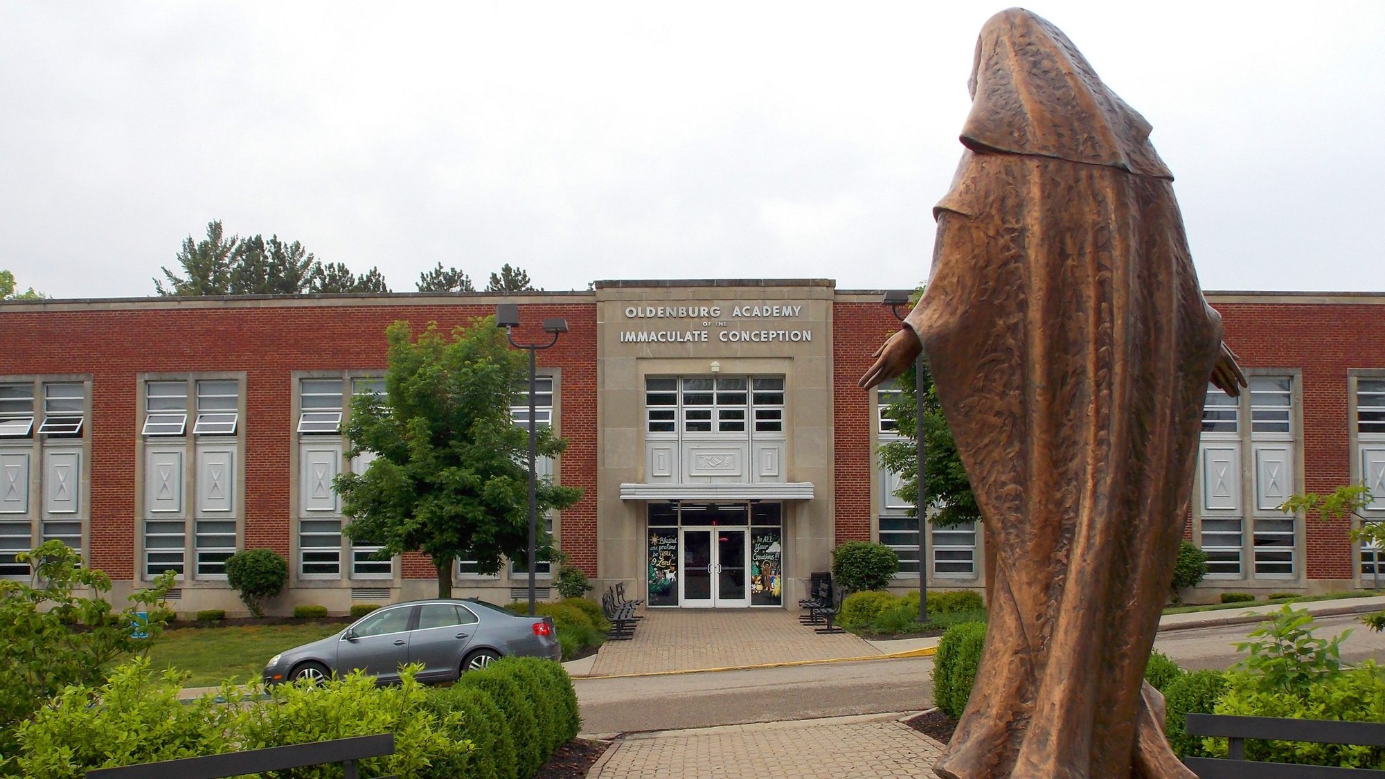 A statue of Mary overlooks the Oldenburg Academy of the Immaculate Conception in Oldenburg, Ind., May 16, 2018. The archbishops of the New York, Boston and Los Angeles archdioceses are urging President Donald Trump and Congress to provide emergency stimulus funding for school choice scholarship programs. (CNS photo/Katie Rutter)