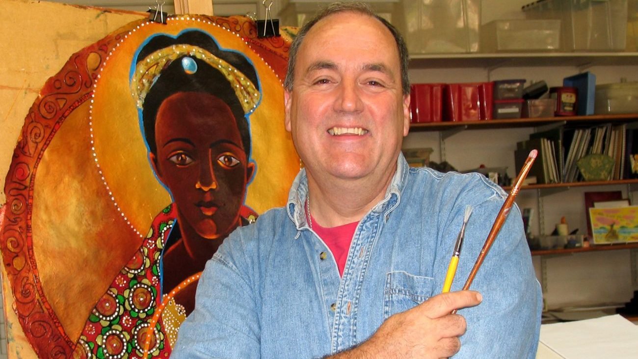 Oblate Brother Mickey McGrath, a liturgical artist attempting to foster healing and justice in the struggle against racism through his work, holds his artistry tools in his Camden, N.J., studio in this undated photo. (CNS photo/courtesy Oblate Brother Mickey McGrath)