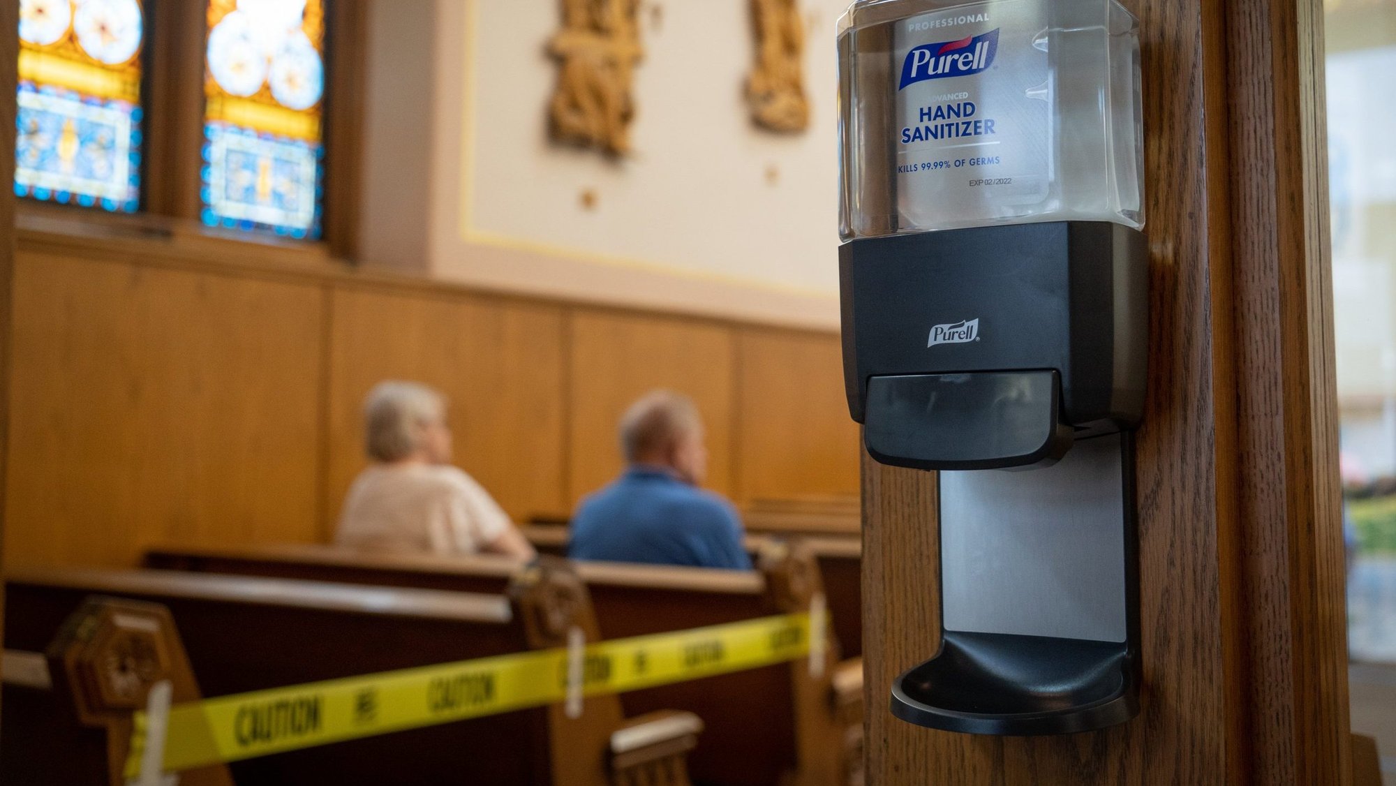 A hand-sanitizing station is seen at the entrance to the sanctuary of St. Louis Church in Batesville, Ind., May 23, 2020, as safety protocols, including social distancing, are observed to minimize the spread of the coronavirus. (CNS photo/Katie Rutter)