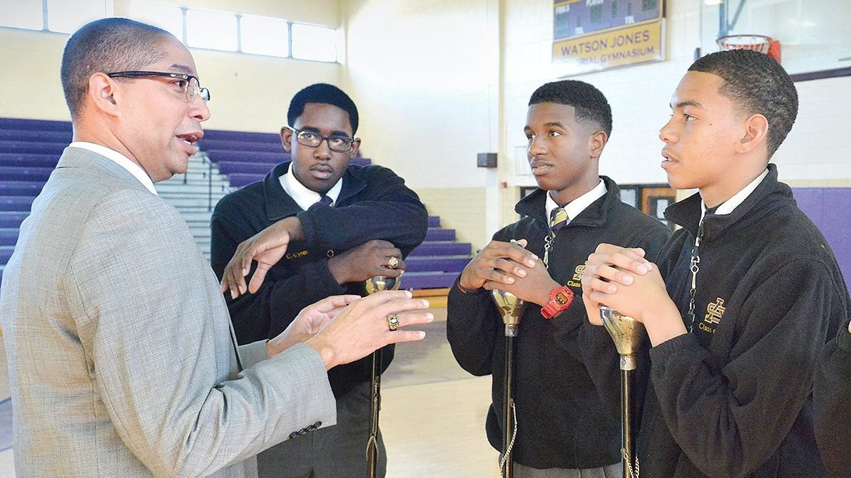 Kenneth St. Charles, president of St. Augustine High School in New Orleans, talks to drum majors in the school's "Marching 100" band in this 2016 file photo. St. Charles officials said they felt overwhelmed by a $1.5 million donation from Twitter CEO Jack Dorsey's #StartSmall initiative, the largest single gift in the school's 69-year history. (CNS photo/Frank J. Methe, Clarion Herald)