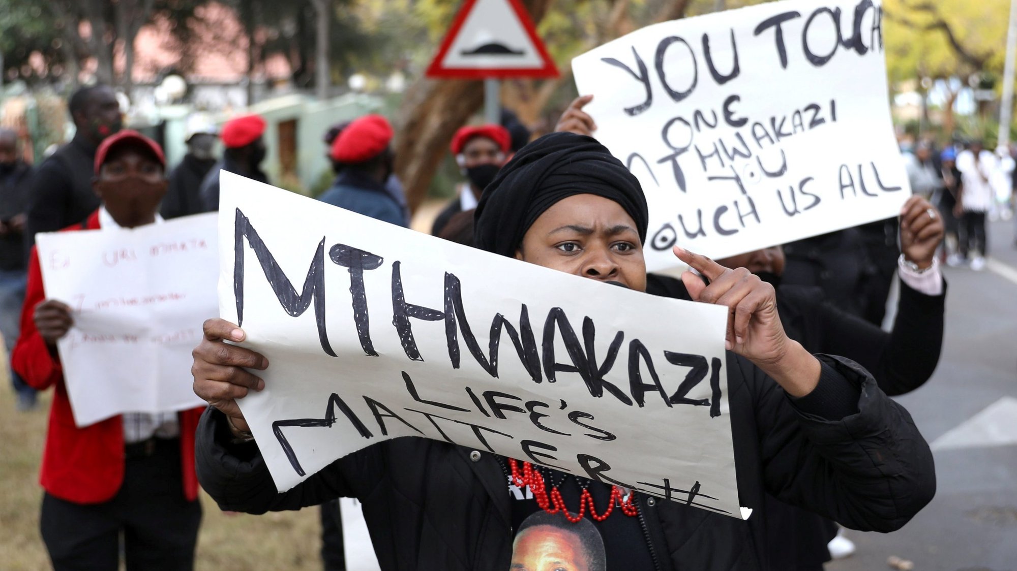 Protesters hold placards during a protest against the Zimbabwe government's record on corruption and human rights abuses, outside the Zimbabwe Embassy in Pretoria, South Africa, Aug. 7, 2020. (CNS photo/Siphiwe Sibeko, Reuters)