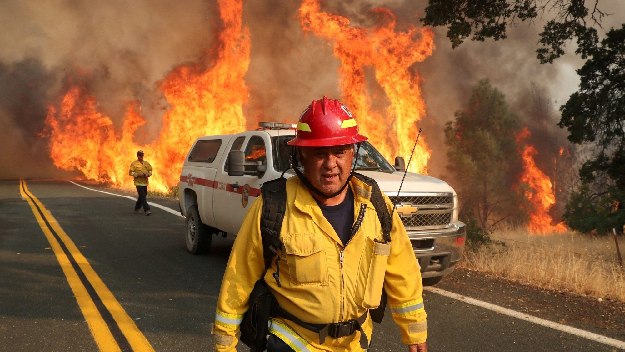 A firefighter from Chula Vista, Calif., monitors the LNU Lightning Complex Fire in Lake County Aug. 23, 2020. (CNS photo/Adrees Latif, Reuters)