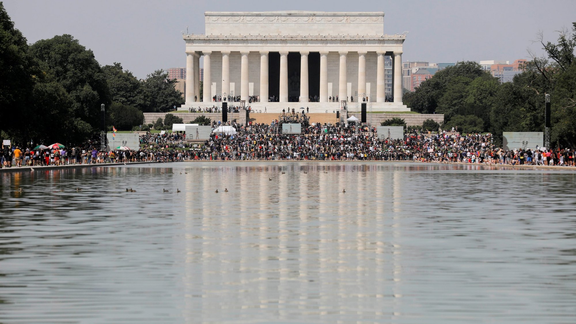 Demonstrators in Washington gather at the Lincoln Memorial for the "Get Your Knee Off Our Necks" march Aug. 28, 2020. The event marked the 57th anniversary of the Rev. Martin Luther King Jr.'s "I Have a Dream" speech that resonated from the same spot on the Lincoln Memorial. (CNS photo/Andrew Kelly, Reuters)