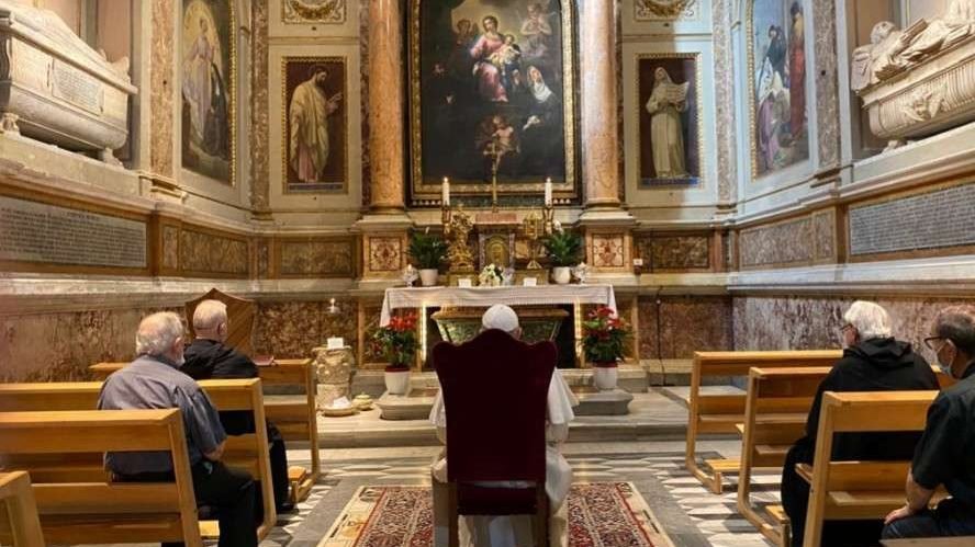 Pope Francis prays in the Basilica of St. Augustine in Campo Marzio, Rome, which contains relics of St. Monica. (Vatican Media via CNA)