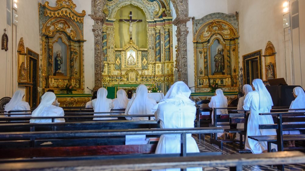 Nuns pray in Misericordia Church in Olinda, Brazil. (Shutterstock image)