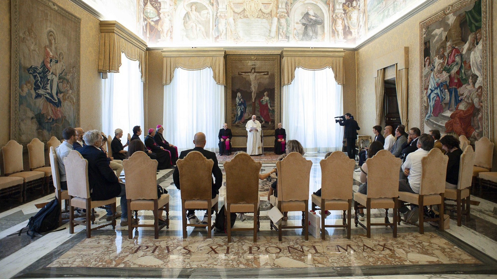 Pope Francis meets at the Vatican with family members of victims of a 2018 Italian nightclub stampede. At the Vatican meeting Sept. 12, 2020, the pope told the family members that the pain of losing a young life to a tragedy was unbearable without God's help. (CNS photo/Vatican Media)